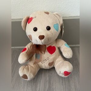 Adorable Tan Teddy Bear with Colorful Hearts